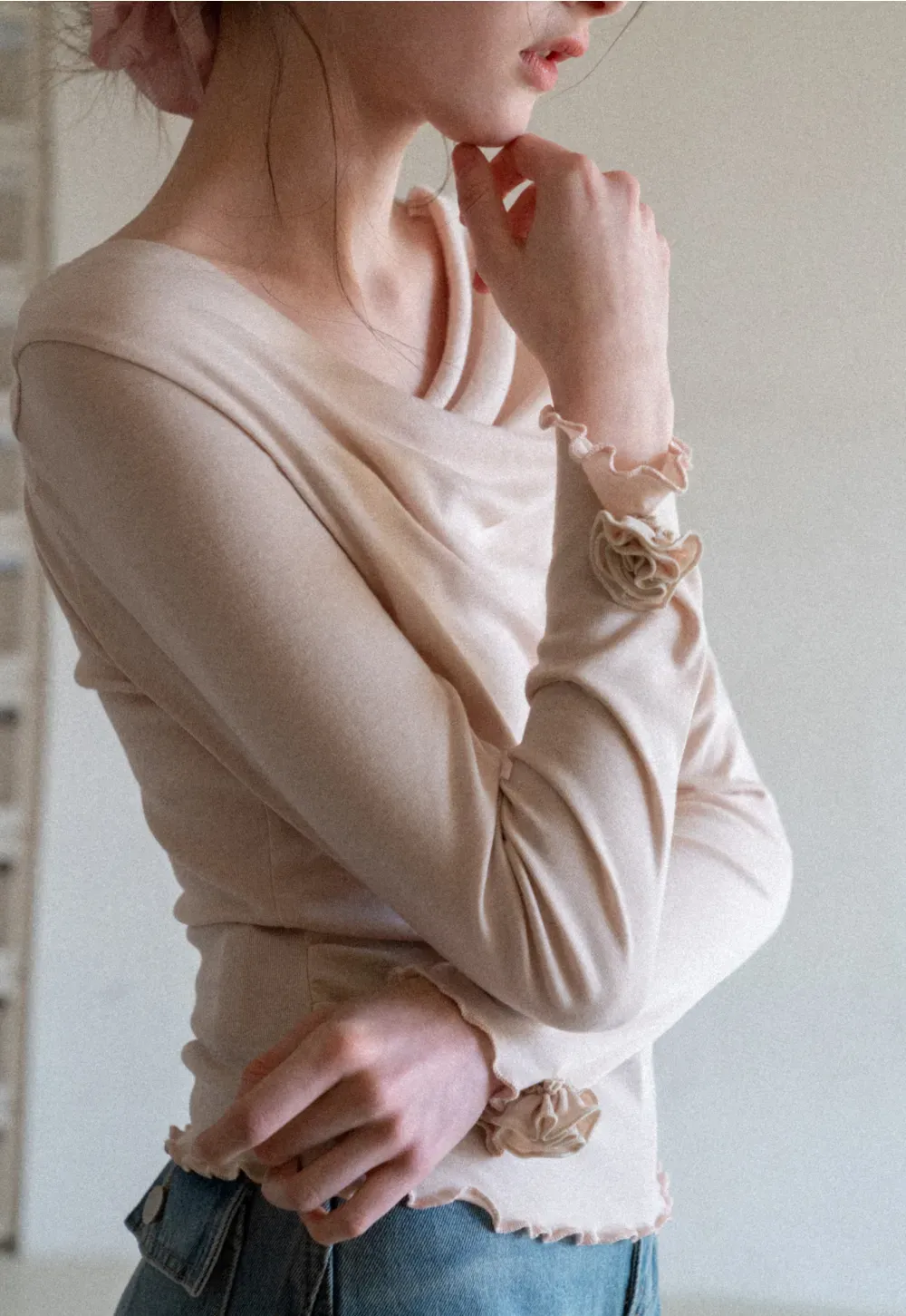 Long sleeve top with ruffled hem and cuffs