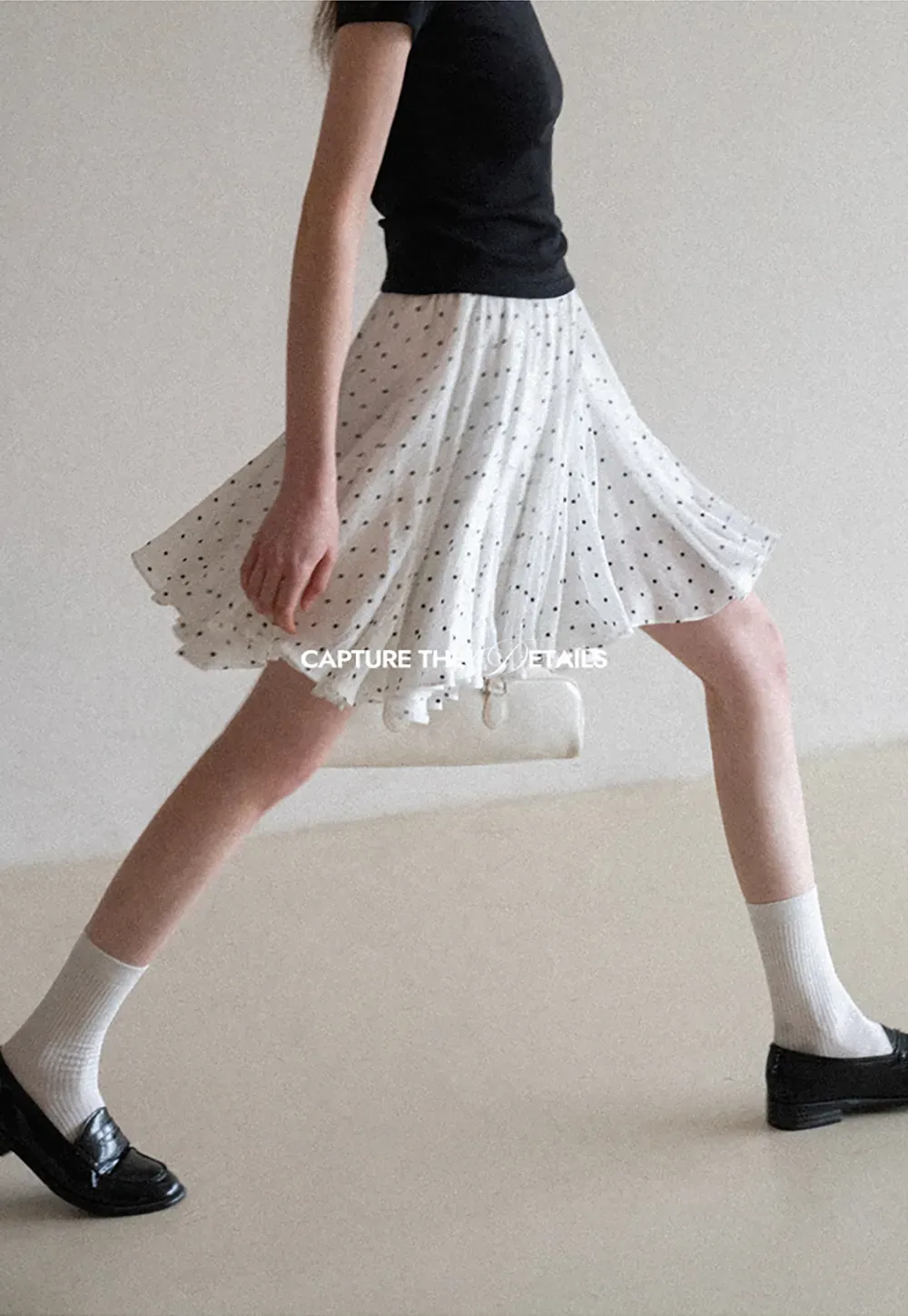 Polka dot pleated skirt with elastic waistband