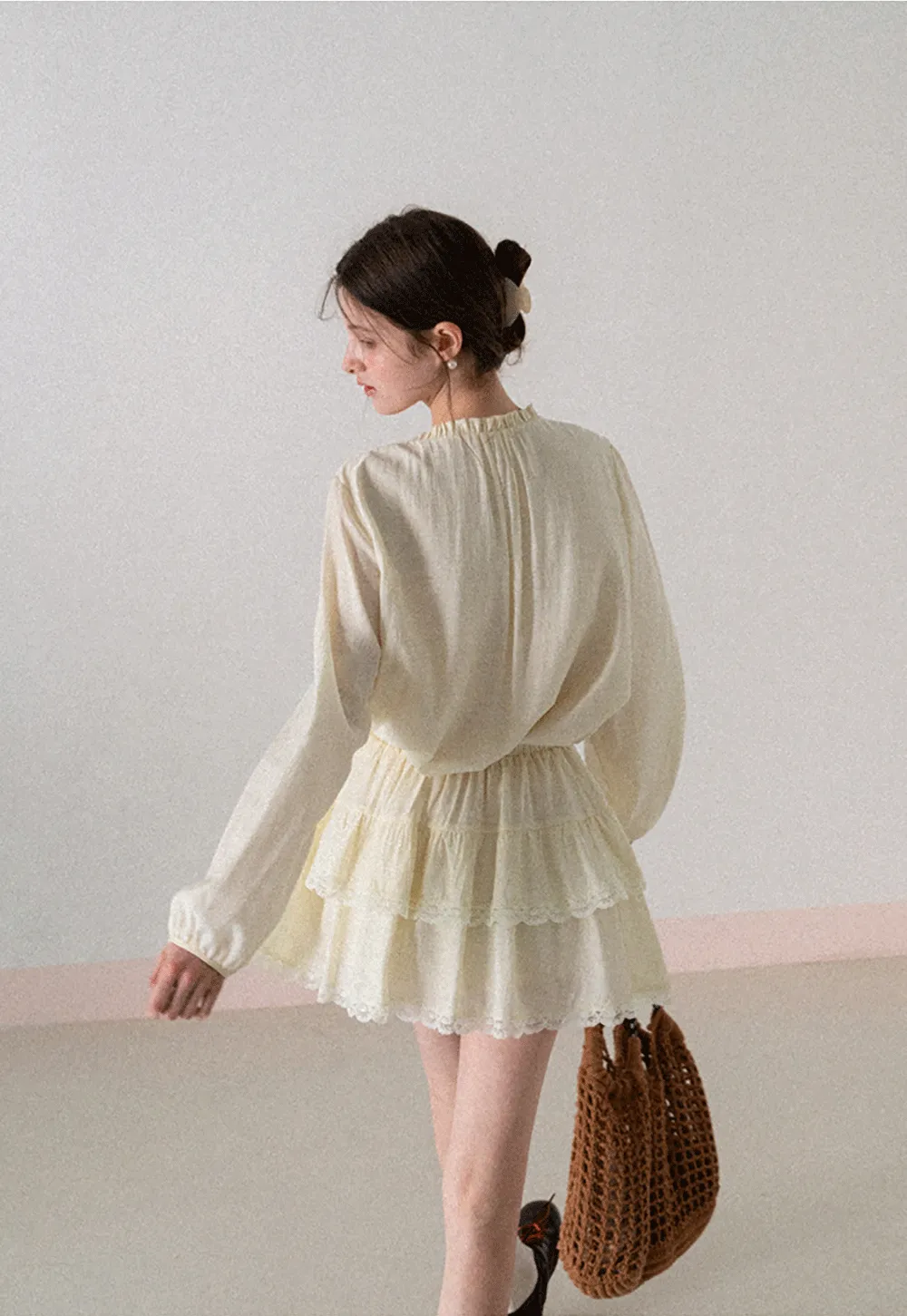 Shirt with ruffled collar and tie front layered skirt