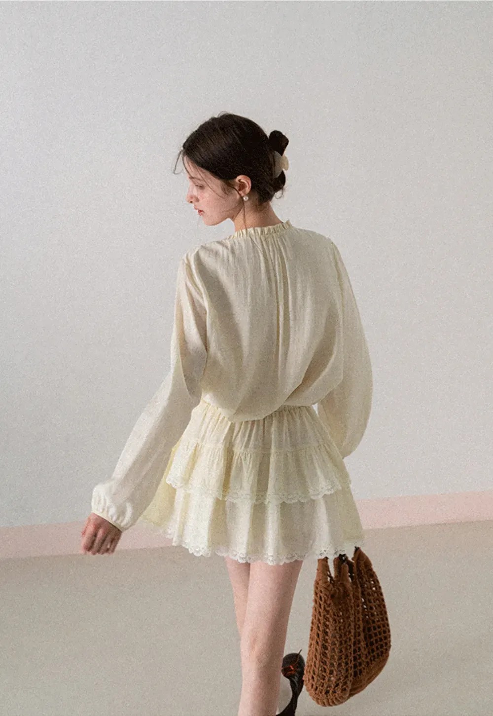 Shirt with ruffled collar and tie front layered skirt