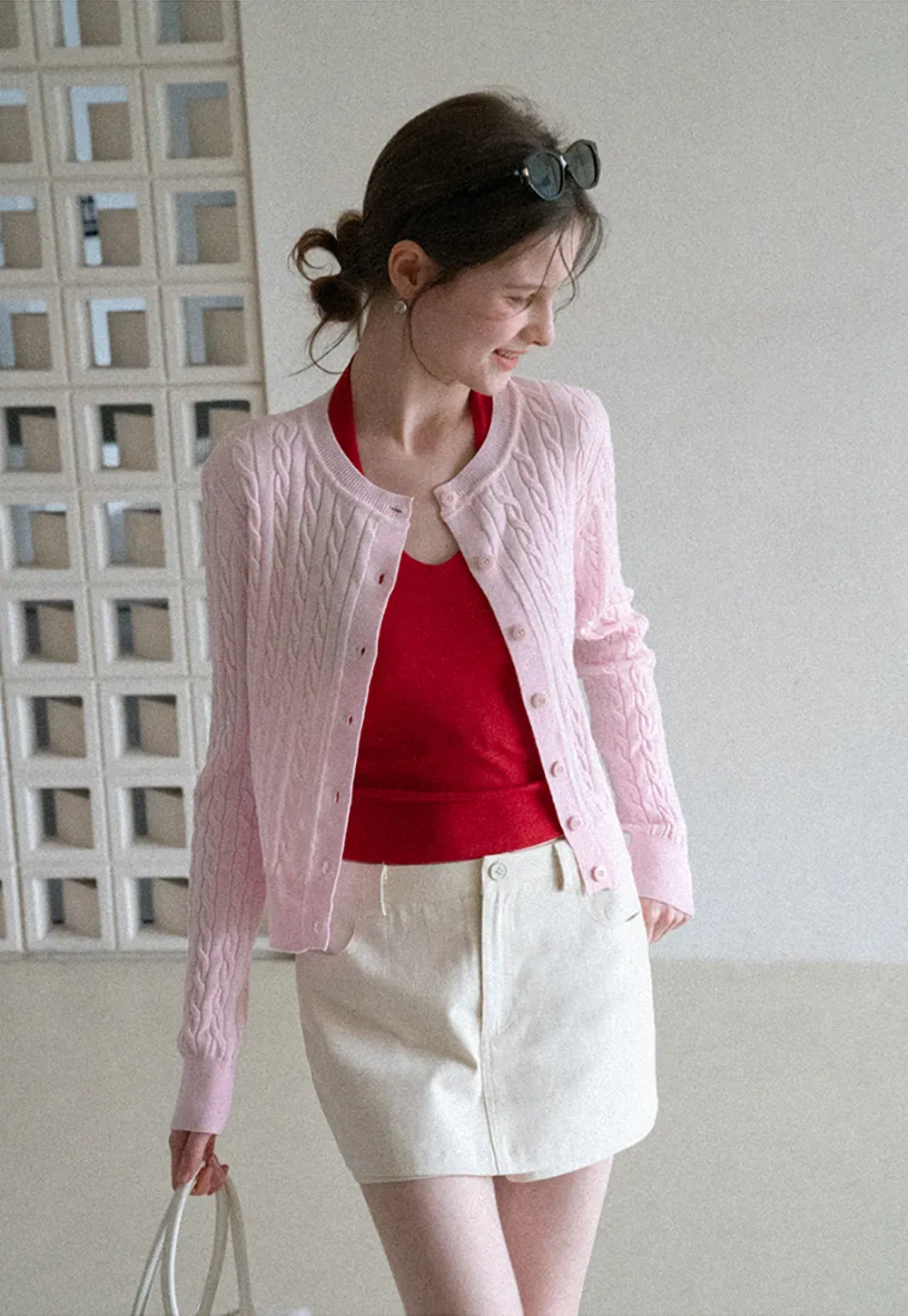 High waist pleated mini skirt with button front design