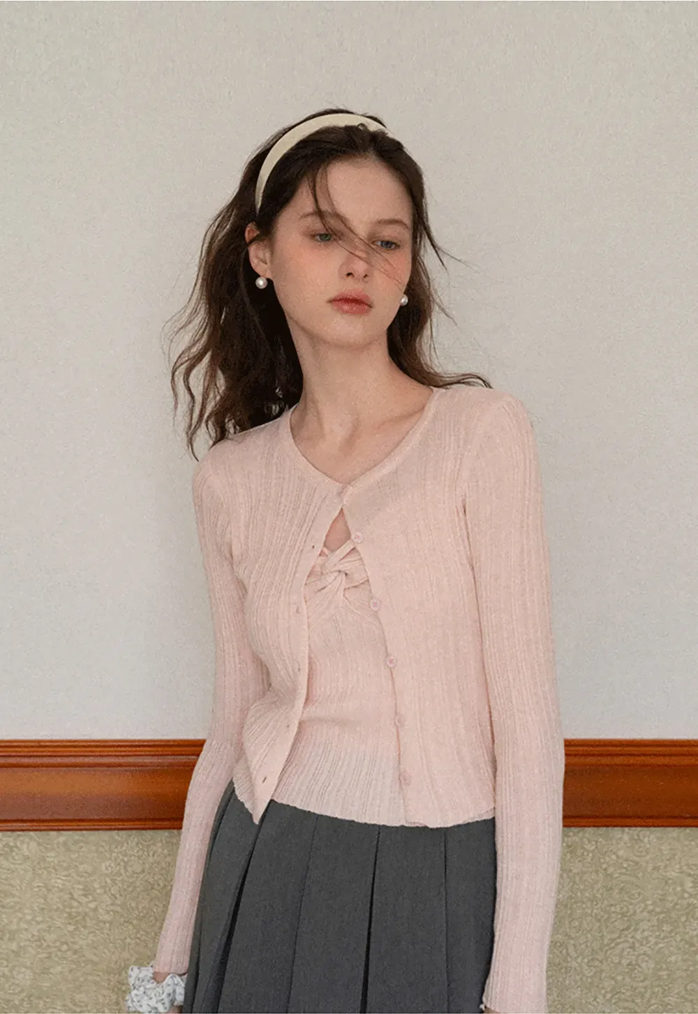 Ribbed knit sweater with V neckline and long sleeves