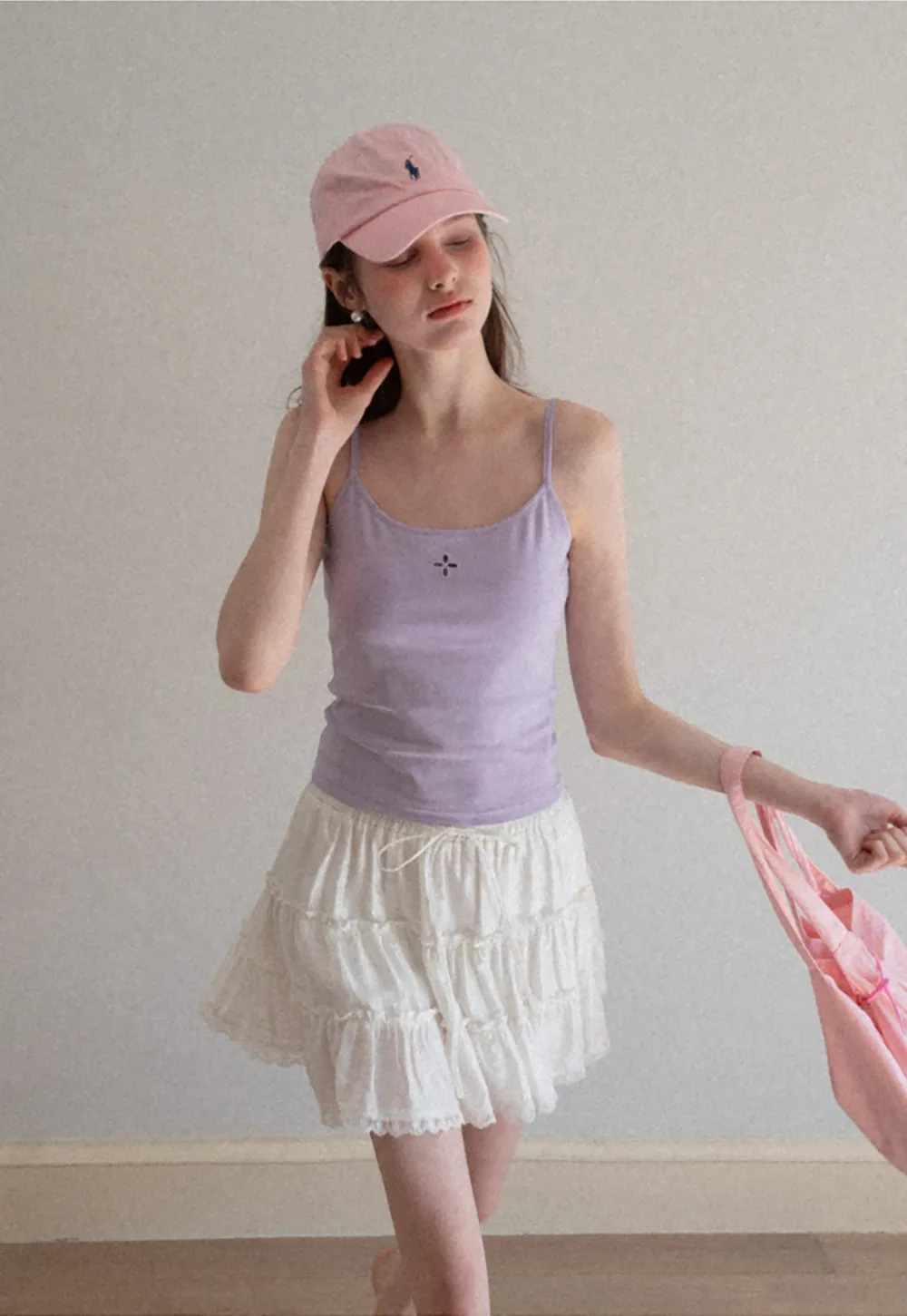 Gray tank top with small embroidered cross detail