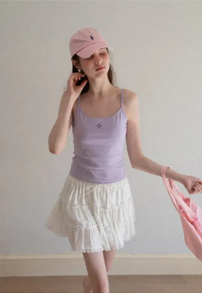 Gray tank top with small embroidered cross detail