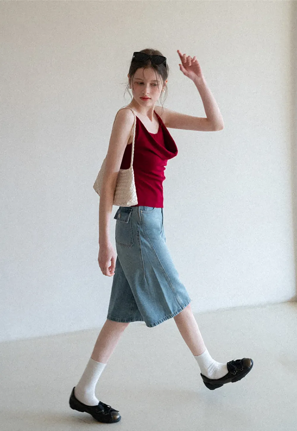 Silk-like tank top with thin straps and draped neckline