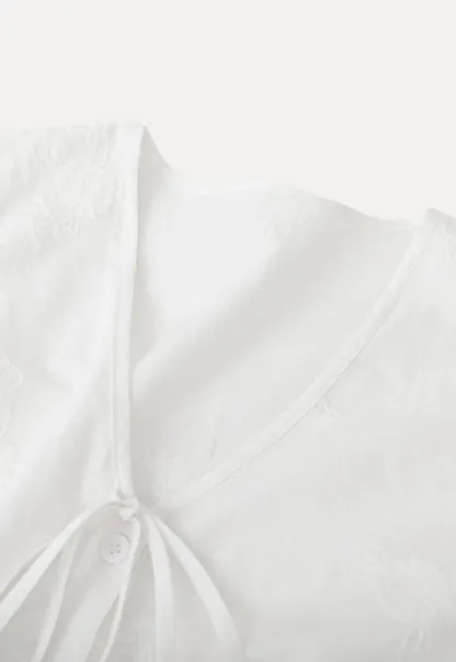 Shirt with ruffled sleeves and layered skirt