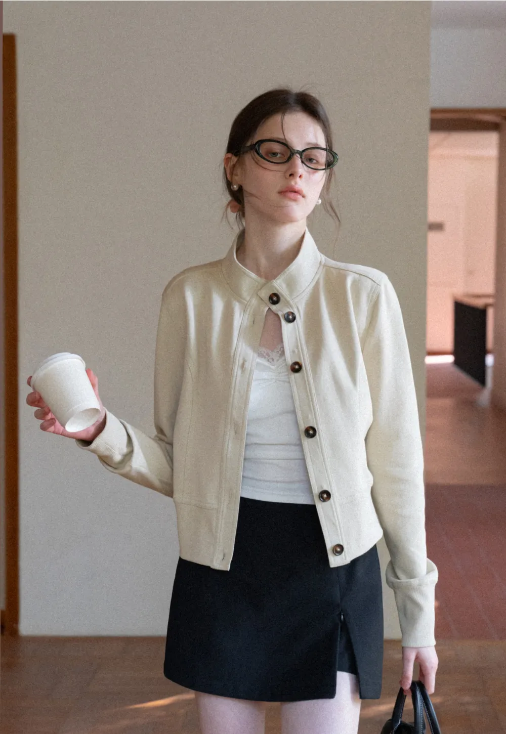 Short jacket with button front and ribbed cuffs