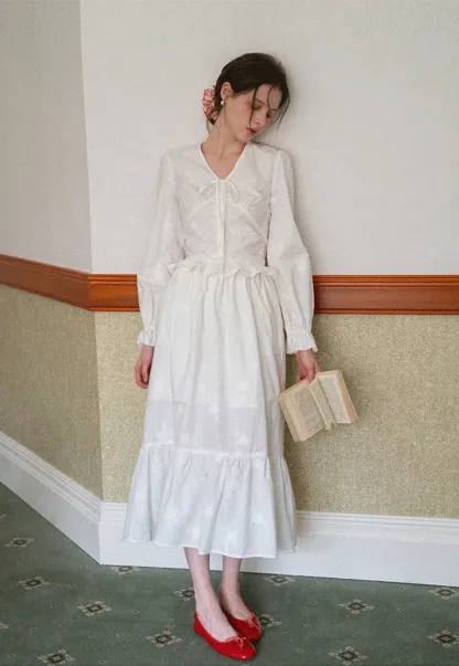 Shirt with ruffled sleeves and layered skirt