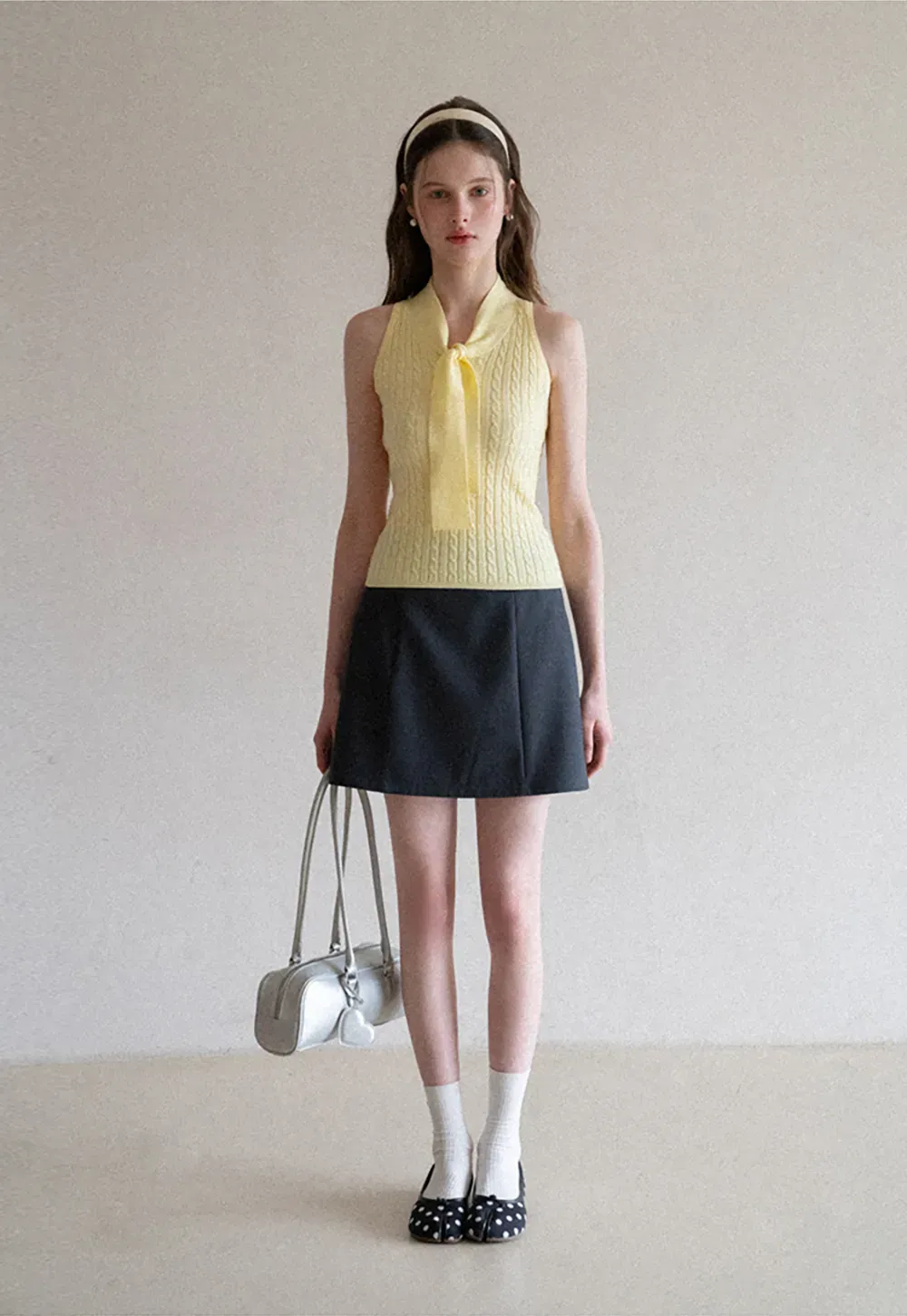 Knit Sleeveless Top with Front Bow Detail