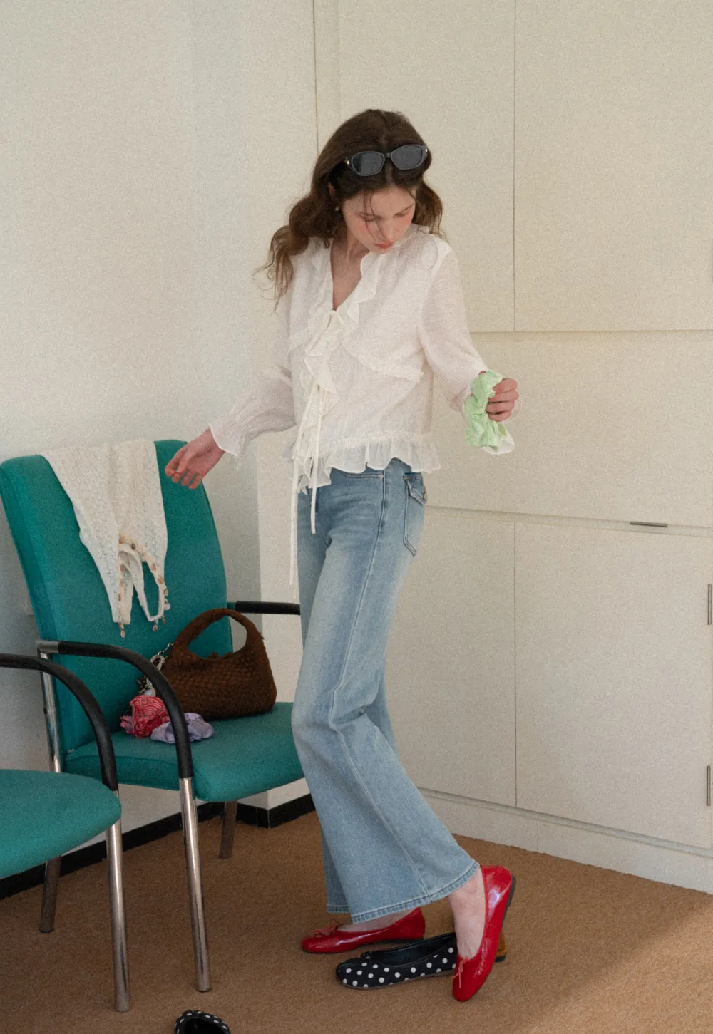 Elegant Blouse with Ruffle Detail and Tie Front Design