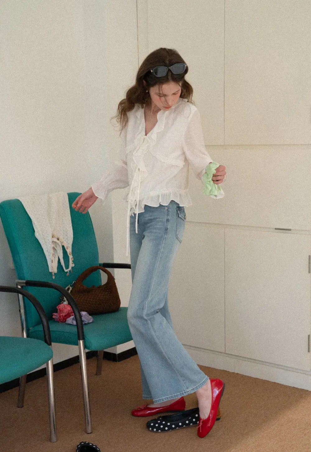 Elegant Blouse with Ruffle Detail and Tie Front Design