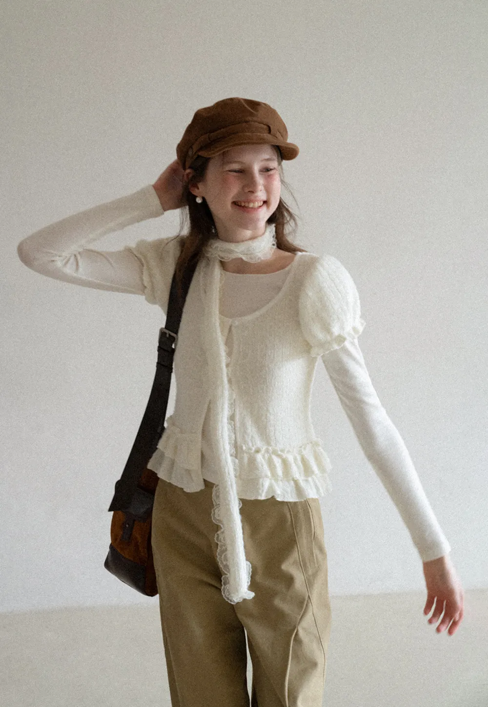 floral lace top with puffed sleeves and ruffled hem