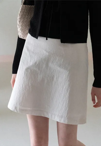 A-line mini skirt with front darts and clean hem