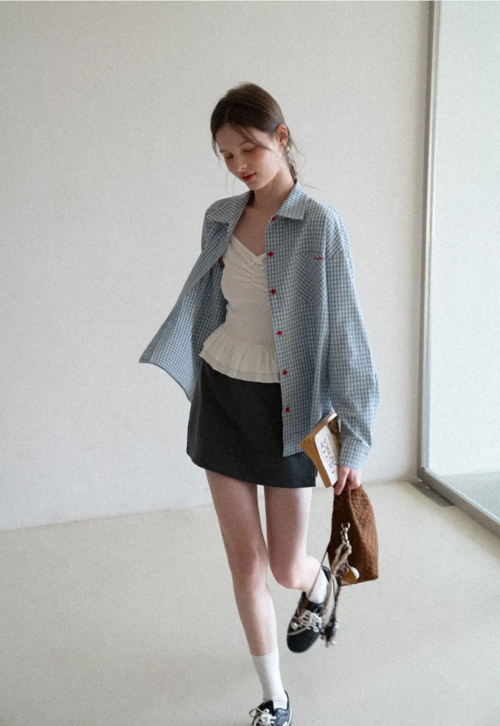 Elegant Pleated Mini Skirt with Asymmetrical Hem