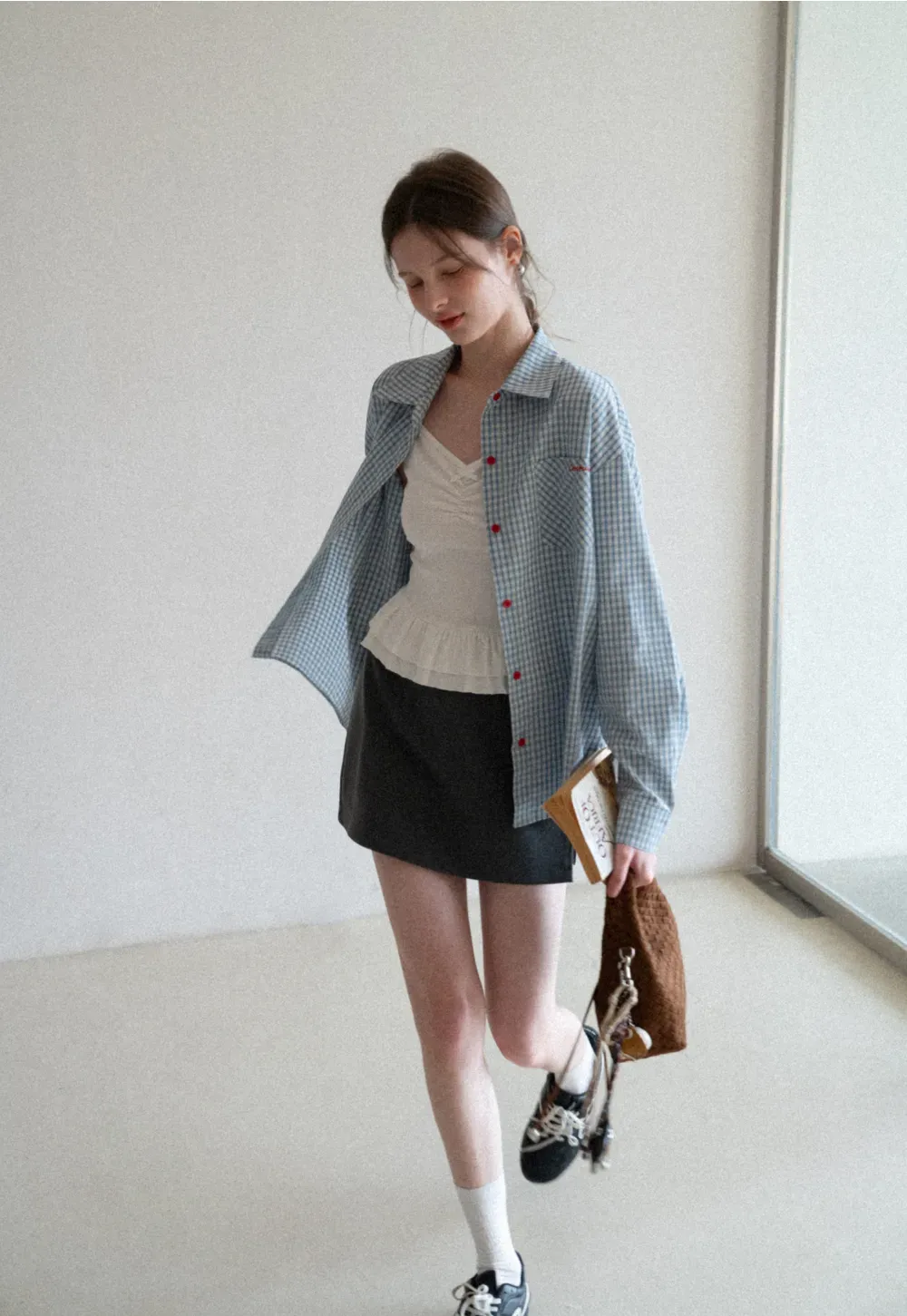 Elegant Pleated Mini Skirt with Asymmetrical Hem