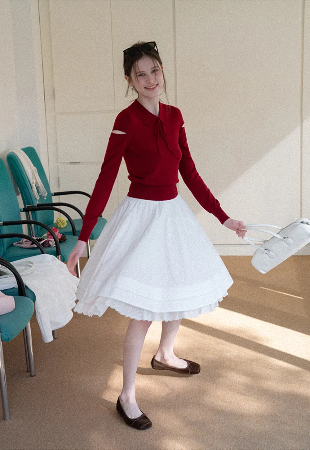 Elegant Knit Sweater with Bow Detail and Cutout Sleeves