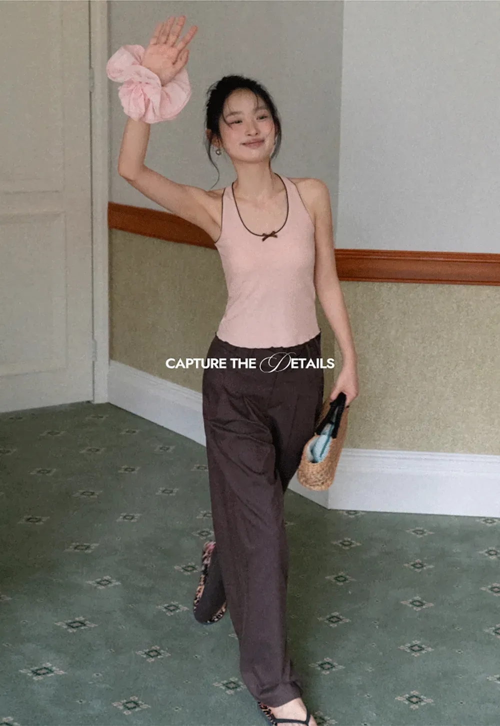 Halter neck tank top with thin straps and bow detail