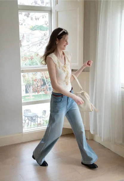 Sleeveless Top with Ruffled V Neck and Floral Detail