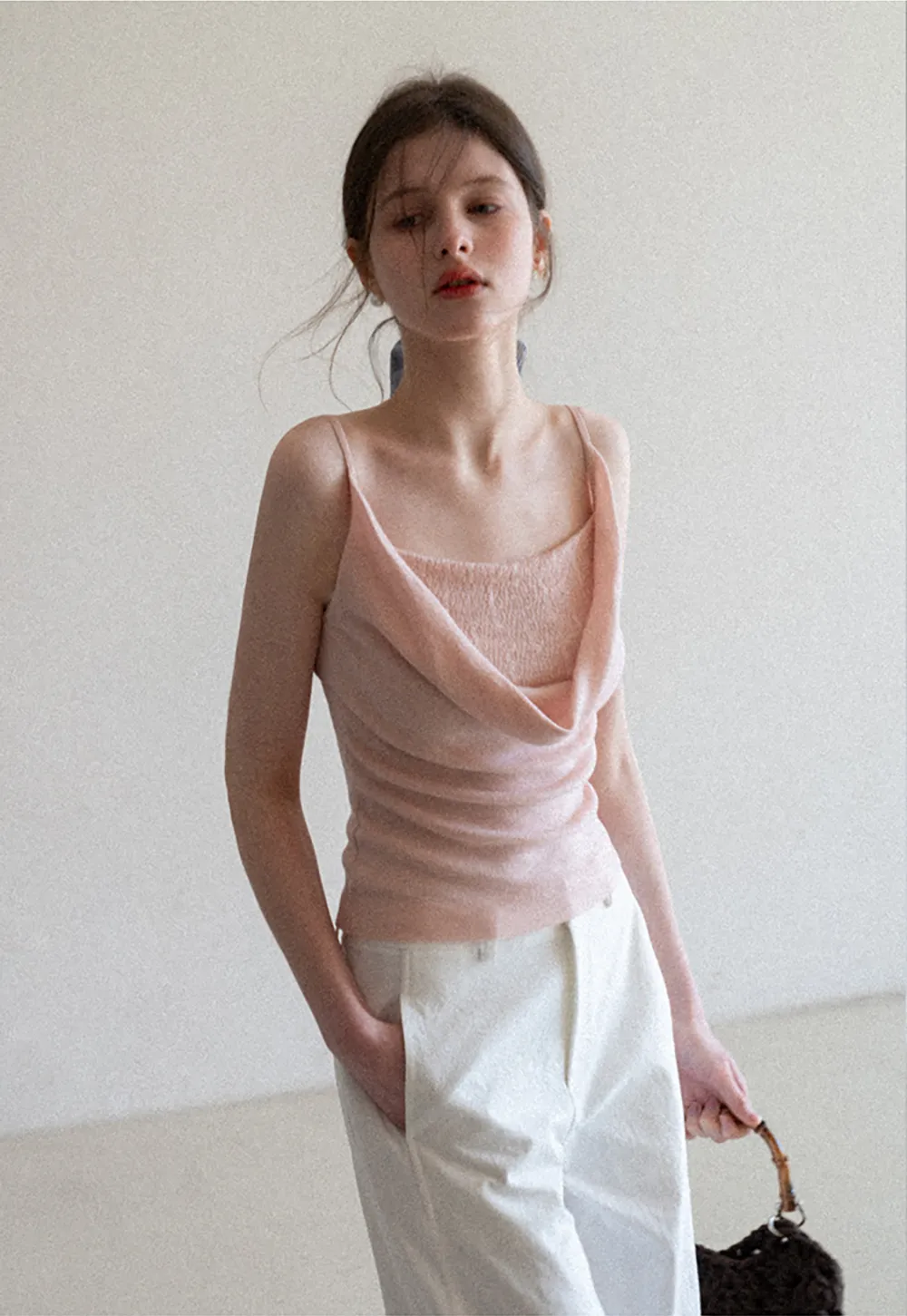 Silk-like tank top with thin straps and draped neckline