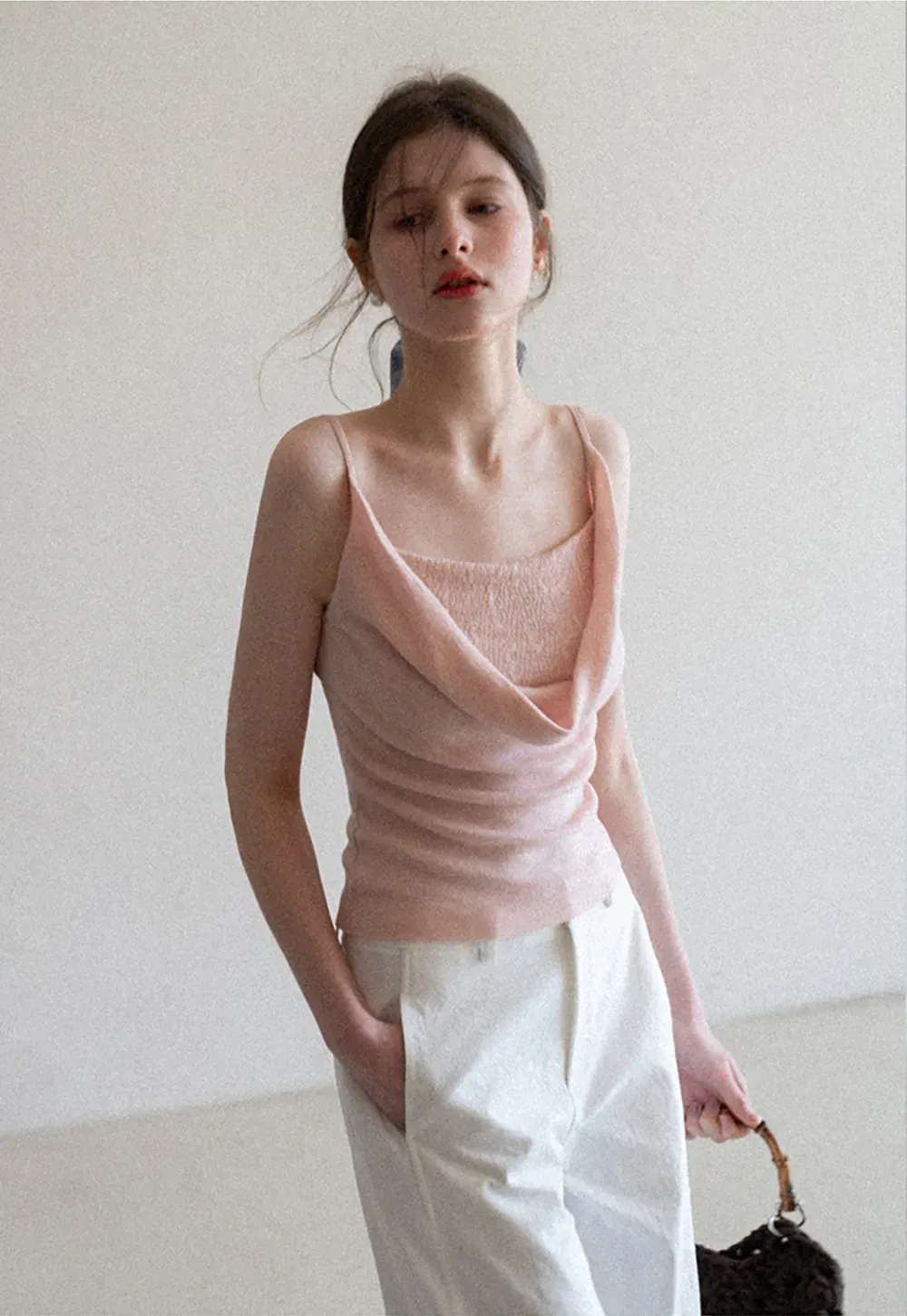 Silk-like tank top with thin straps and draped neckline