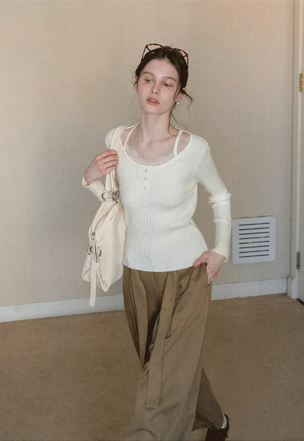 Ribbed knit sweater with boat neck and long sleeves