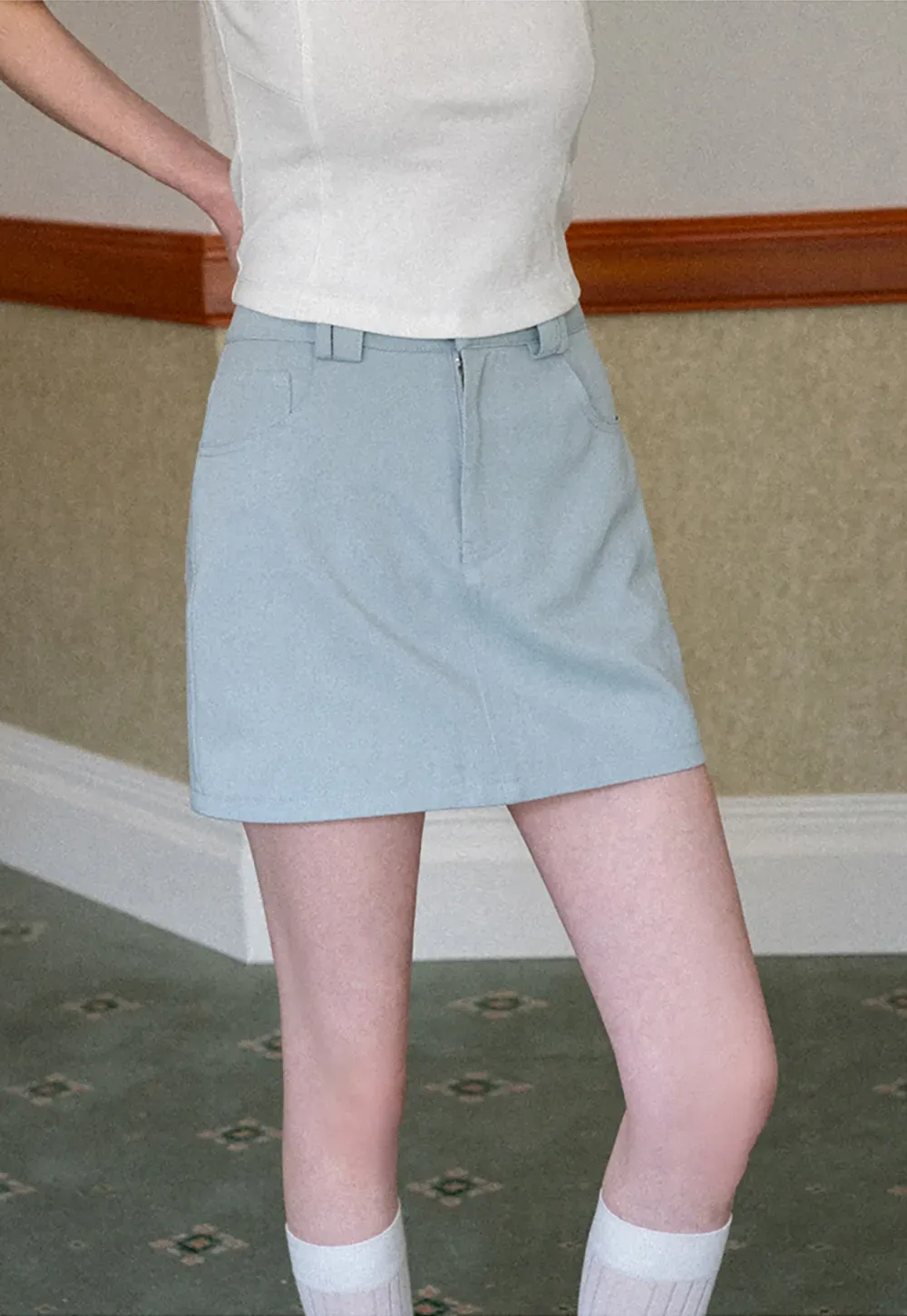 A-line mini skirt with front zipper and belt loops