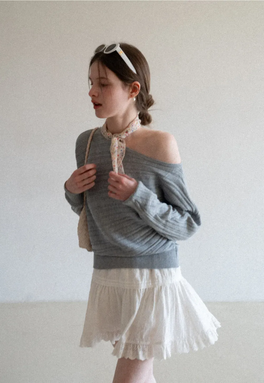 Ribbed knit sweater with wide neckline and long sleeves