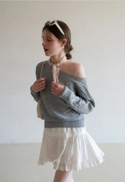 Ribbed knit sweater with wide neckline and long sleeves