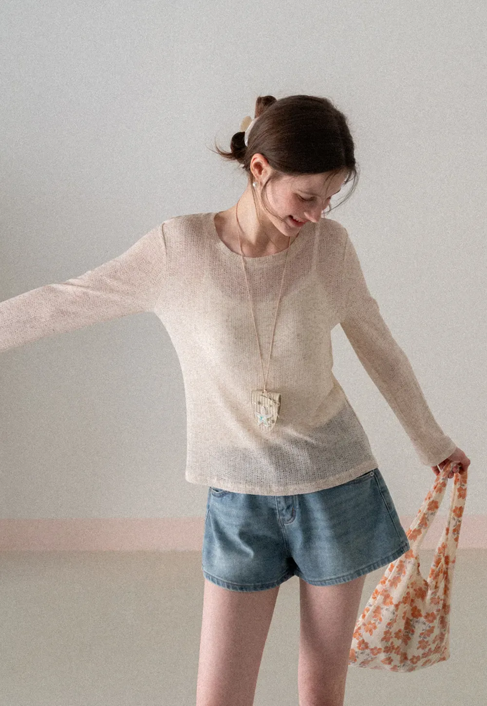 Long sleeve sheer knit top with round neckline