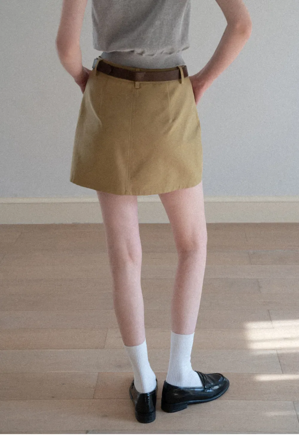 A-line mini skirt with front pockets and belt loops