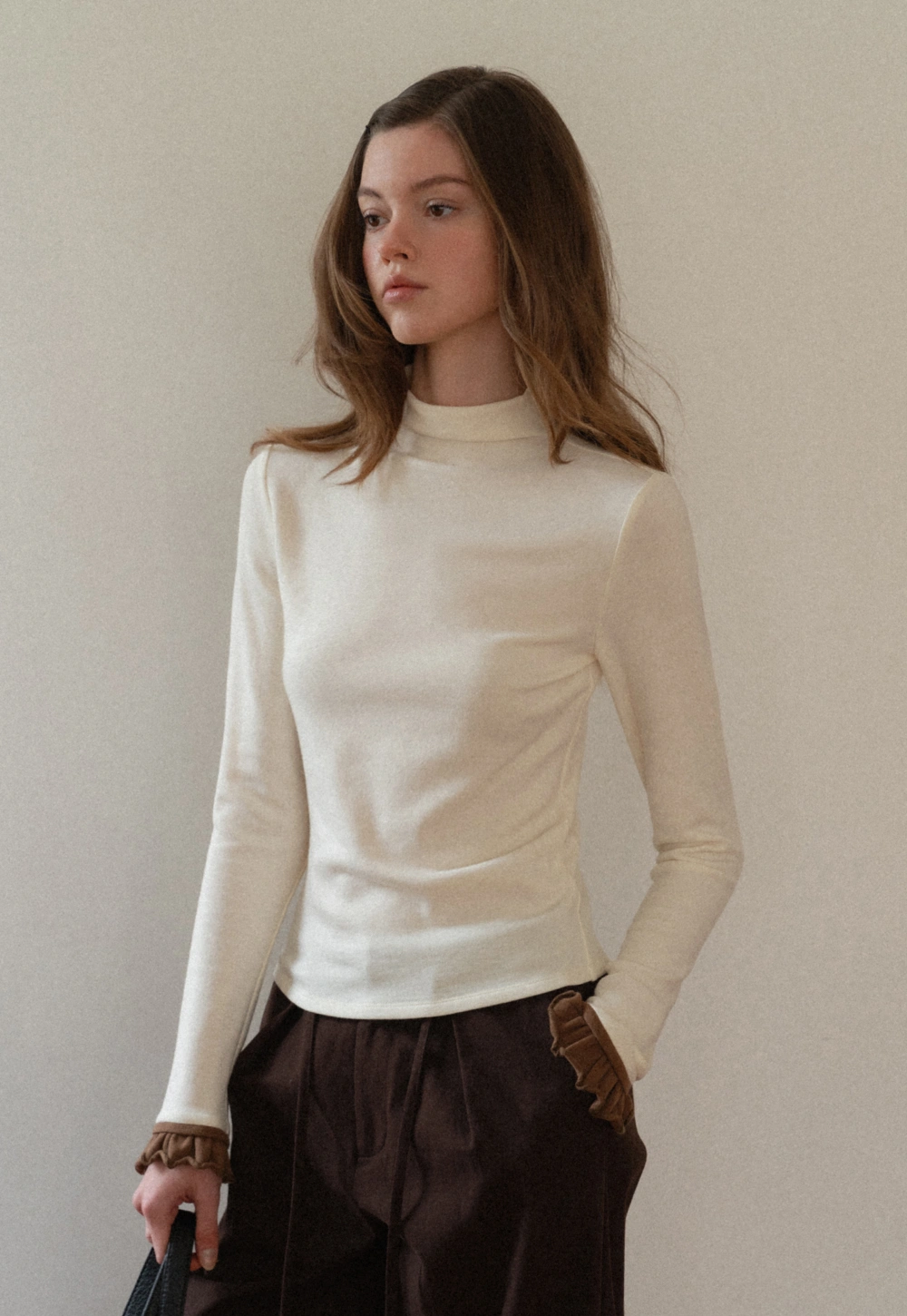 Soft Turtleneck Top with Ruffled Sleeve Cuffs