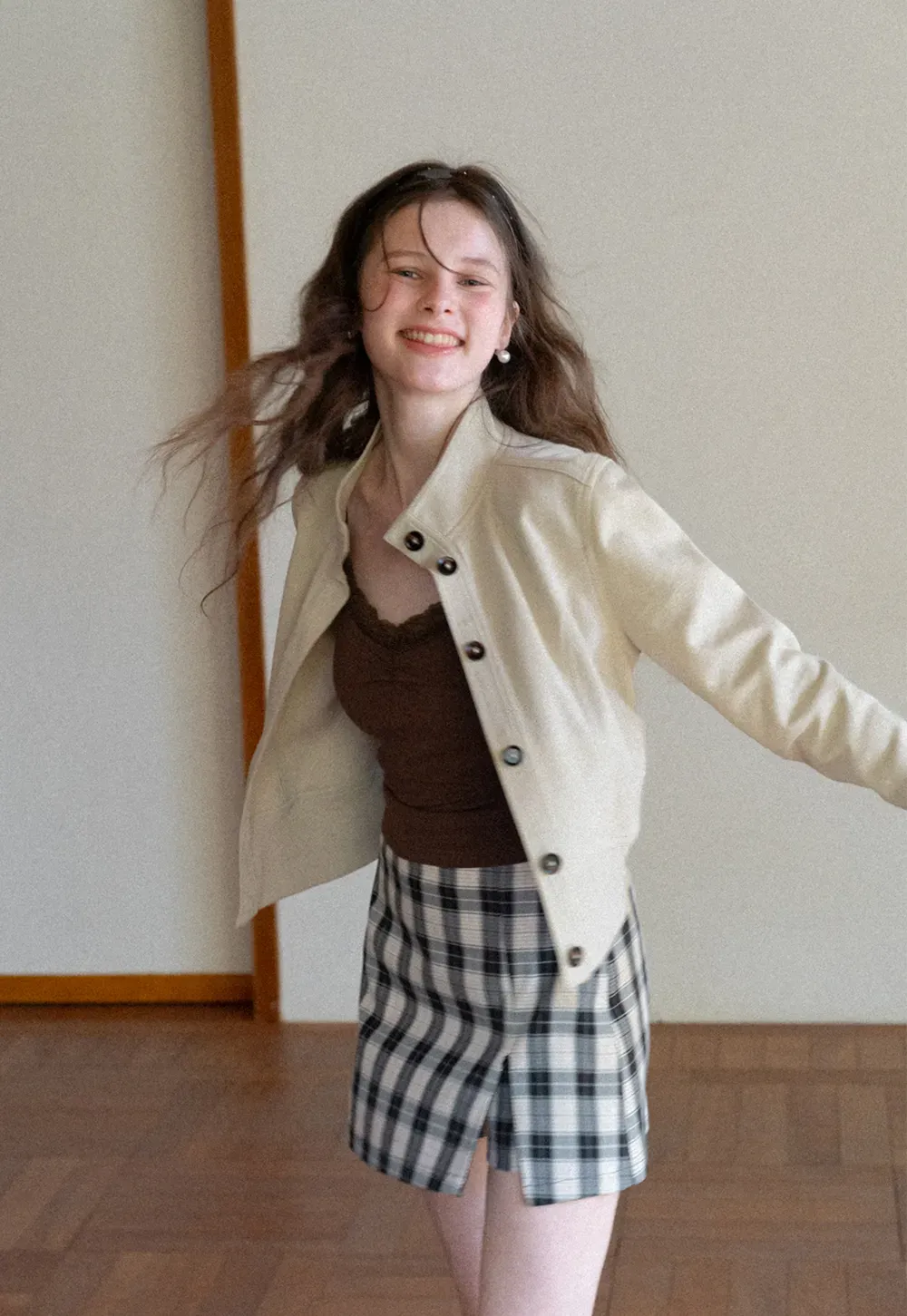 Short jacket with button front and ribbed cuffs