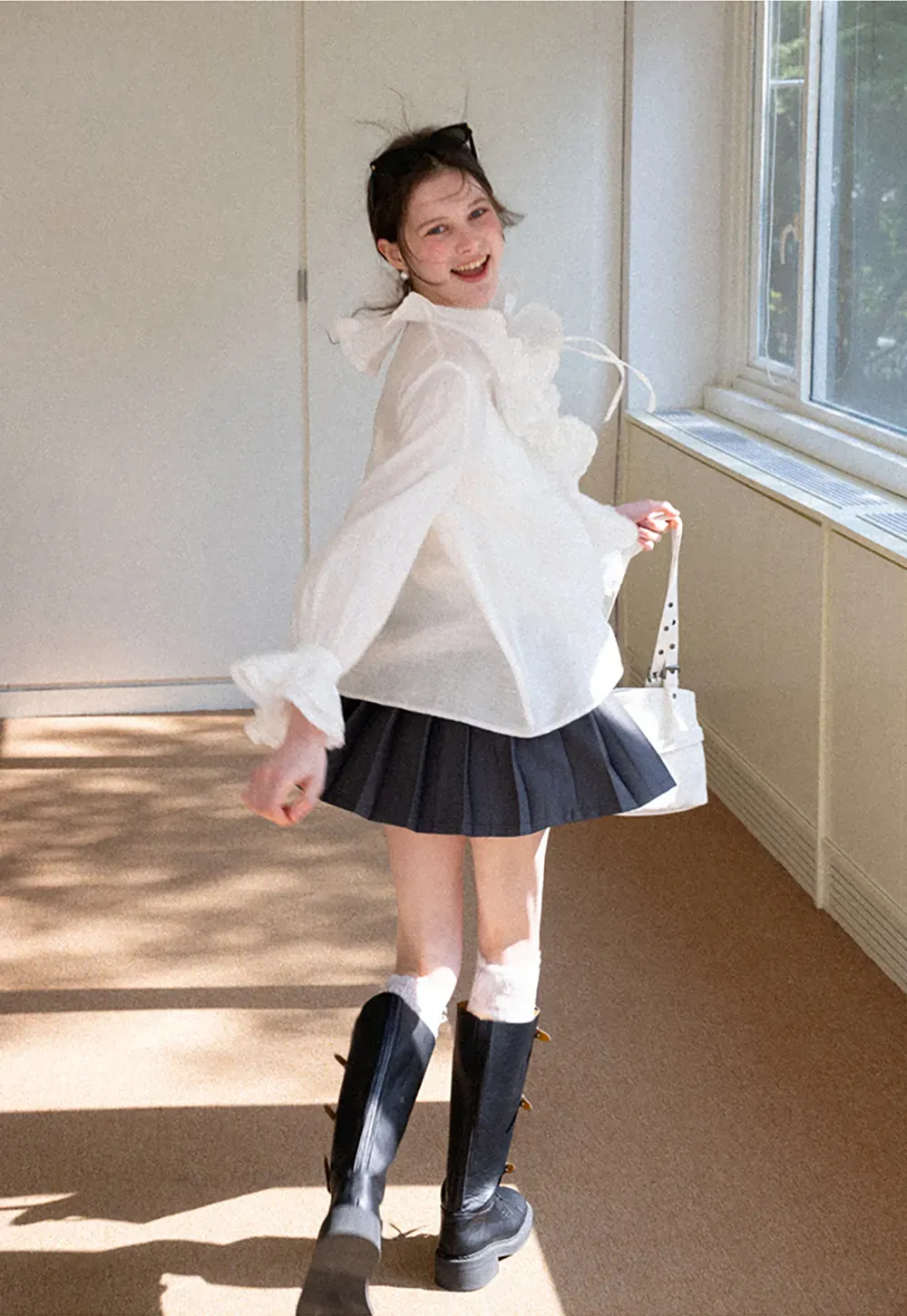 Pleated skirt with high waist and flared hem