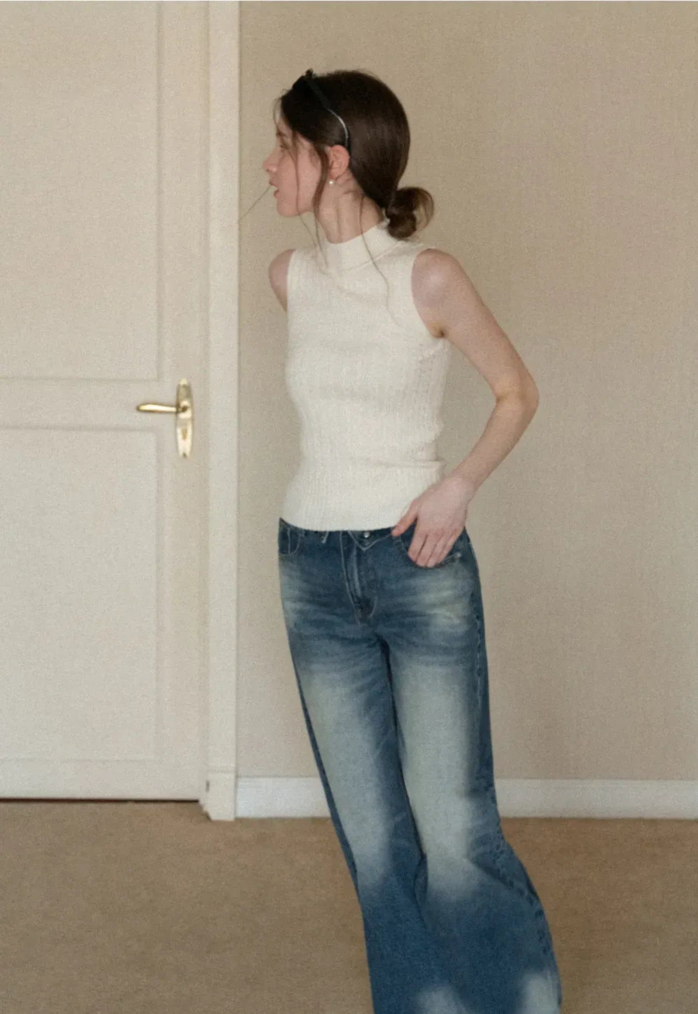 Cable Knit Sleeveless Top with High Neck Design