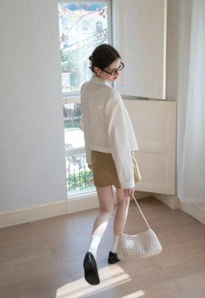 A-line mini skirt with front pockets and belt loops