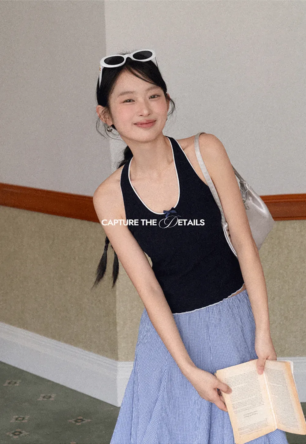 Halter neck tank top with thin straps and bow detail