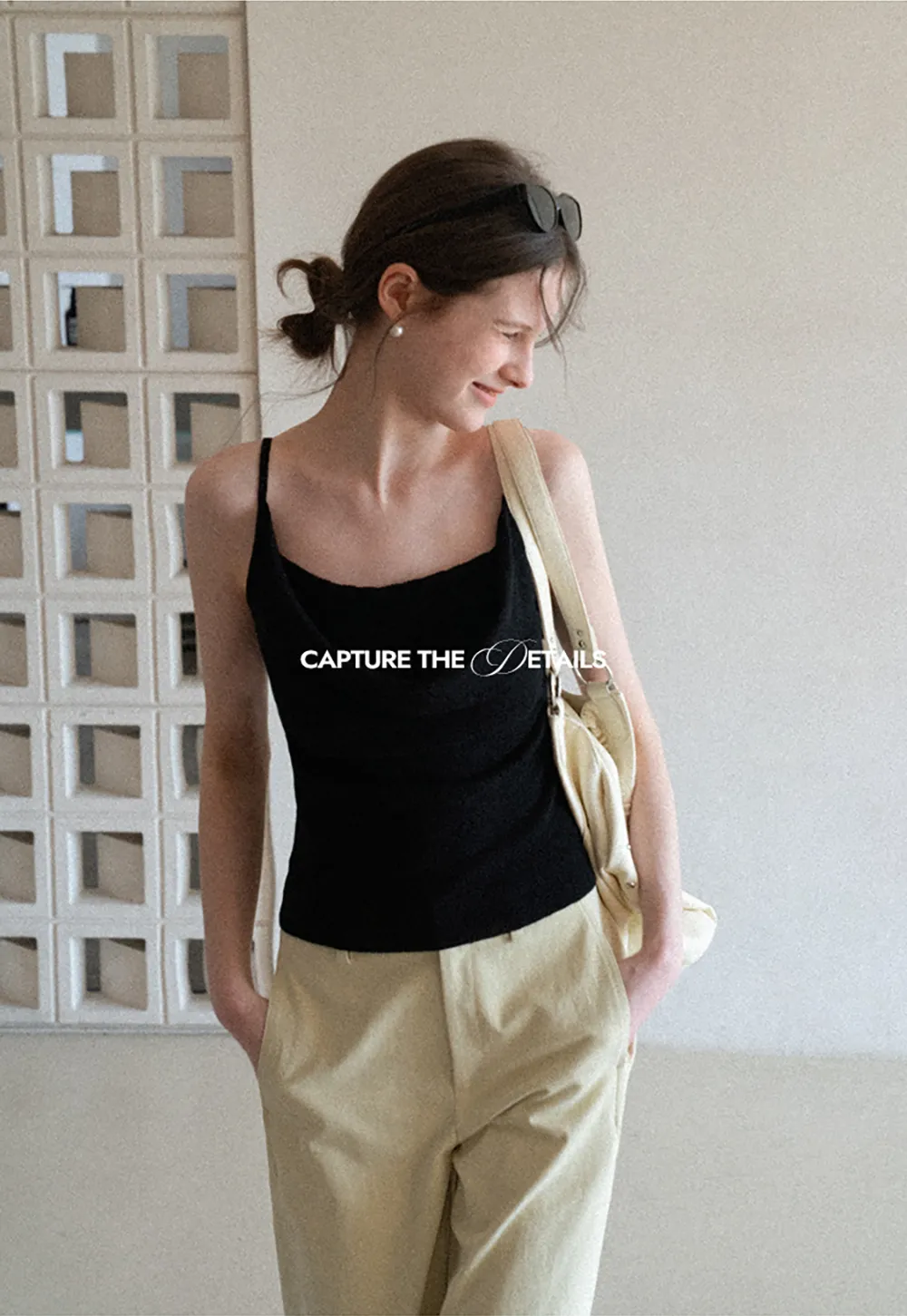 Silk-like tank top with thin straps and draped neckline