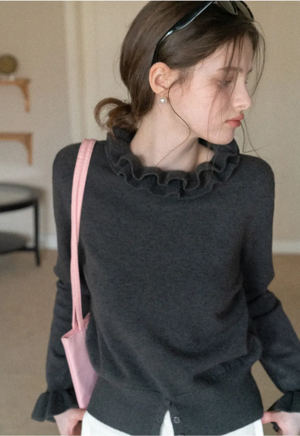 Elegant Ruffle Detail Knit Sweater with Flared Cuffs and Neckline