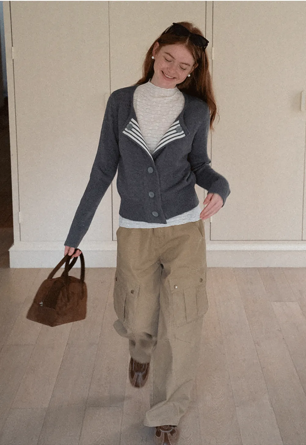 Elegant textured long sleeve top with subtle pattern design