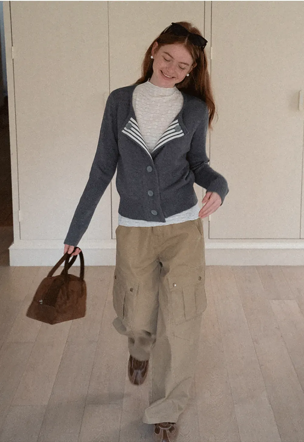 Elegant textured long sleeve top with subtle pattern design