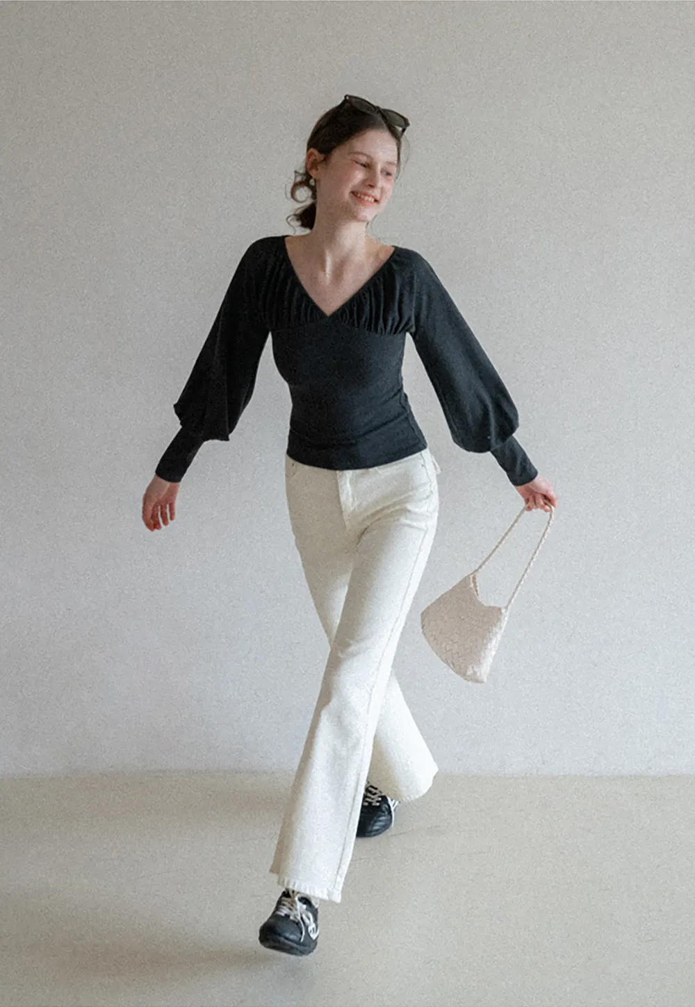 V neck long sleeve top with ruched detail