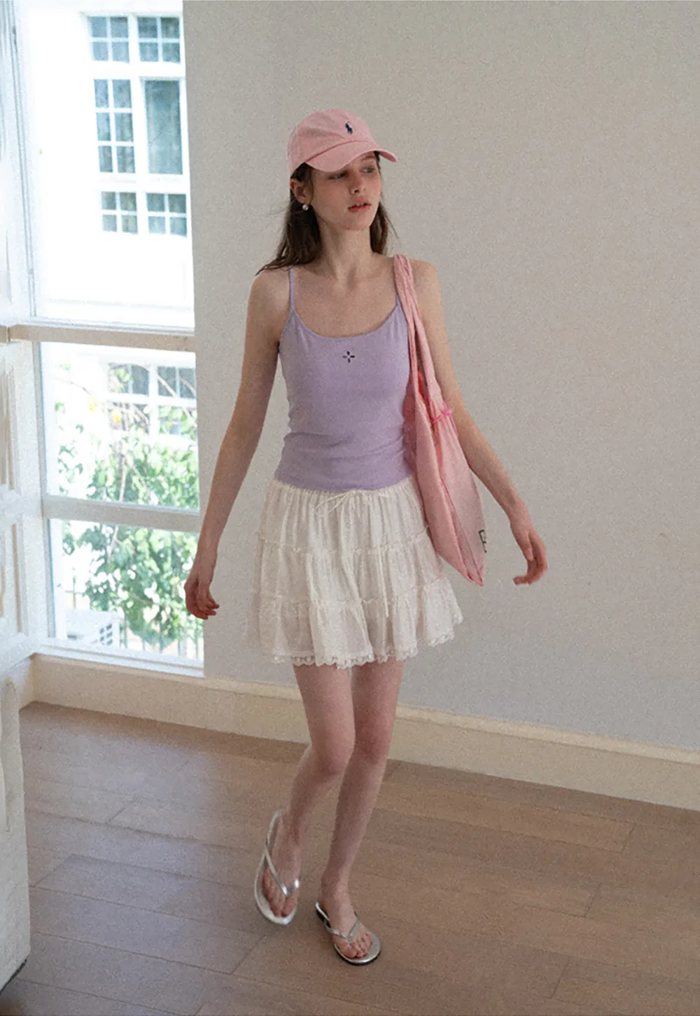 Gray tank top with small embroidered cross detail