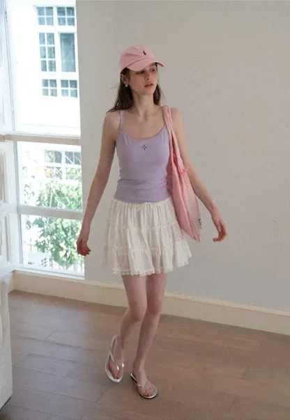 Gray tank top with small embroidered cross detail