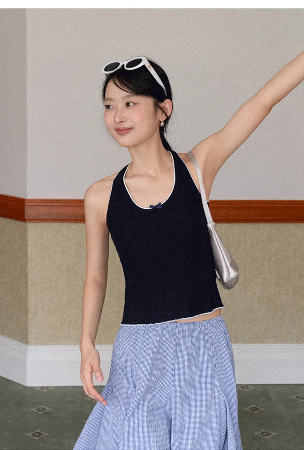 Halter neck tank top with thin straps and bow detail