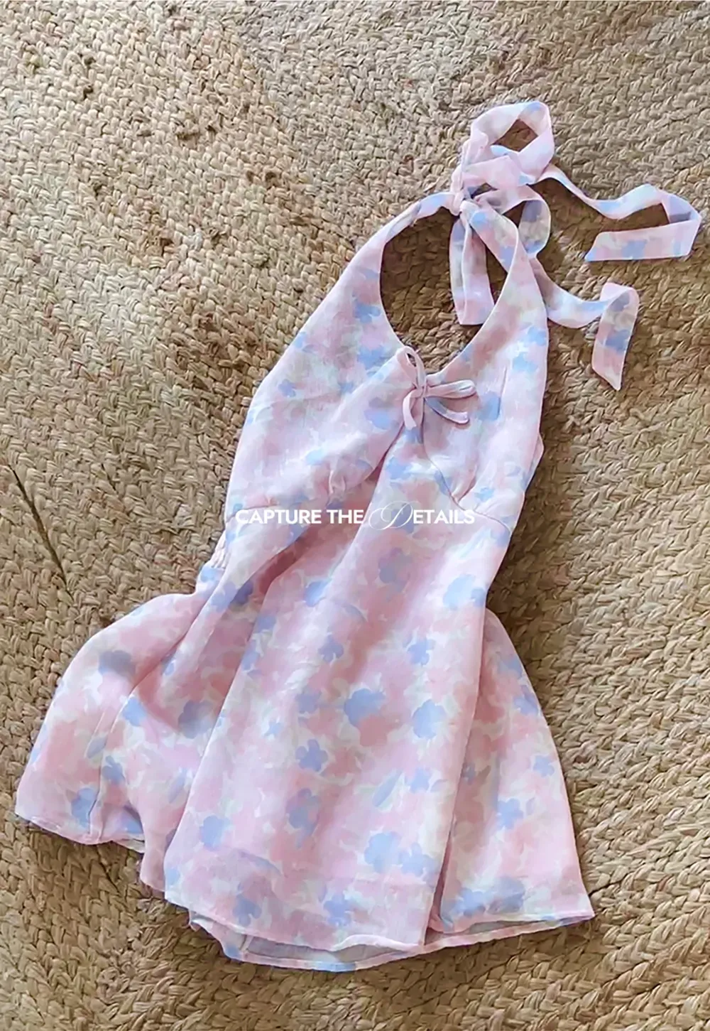 Woolen knit sweater with tie front and floral tank top