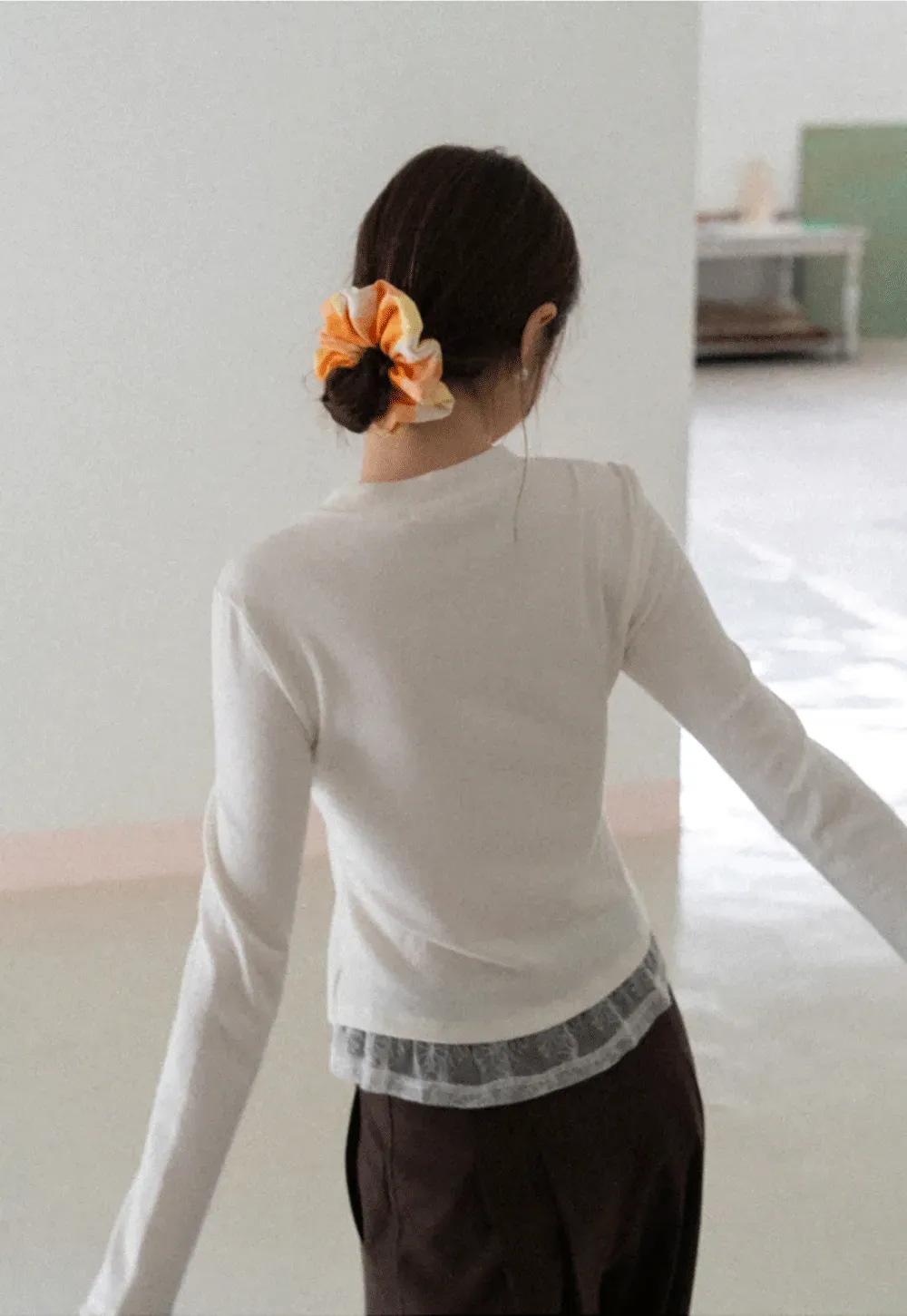 Long sleeve button front knit top with collar