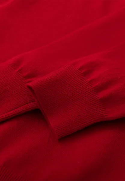 Woolen knit sweater with horse and bow motifs