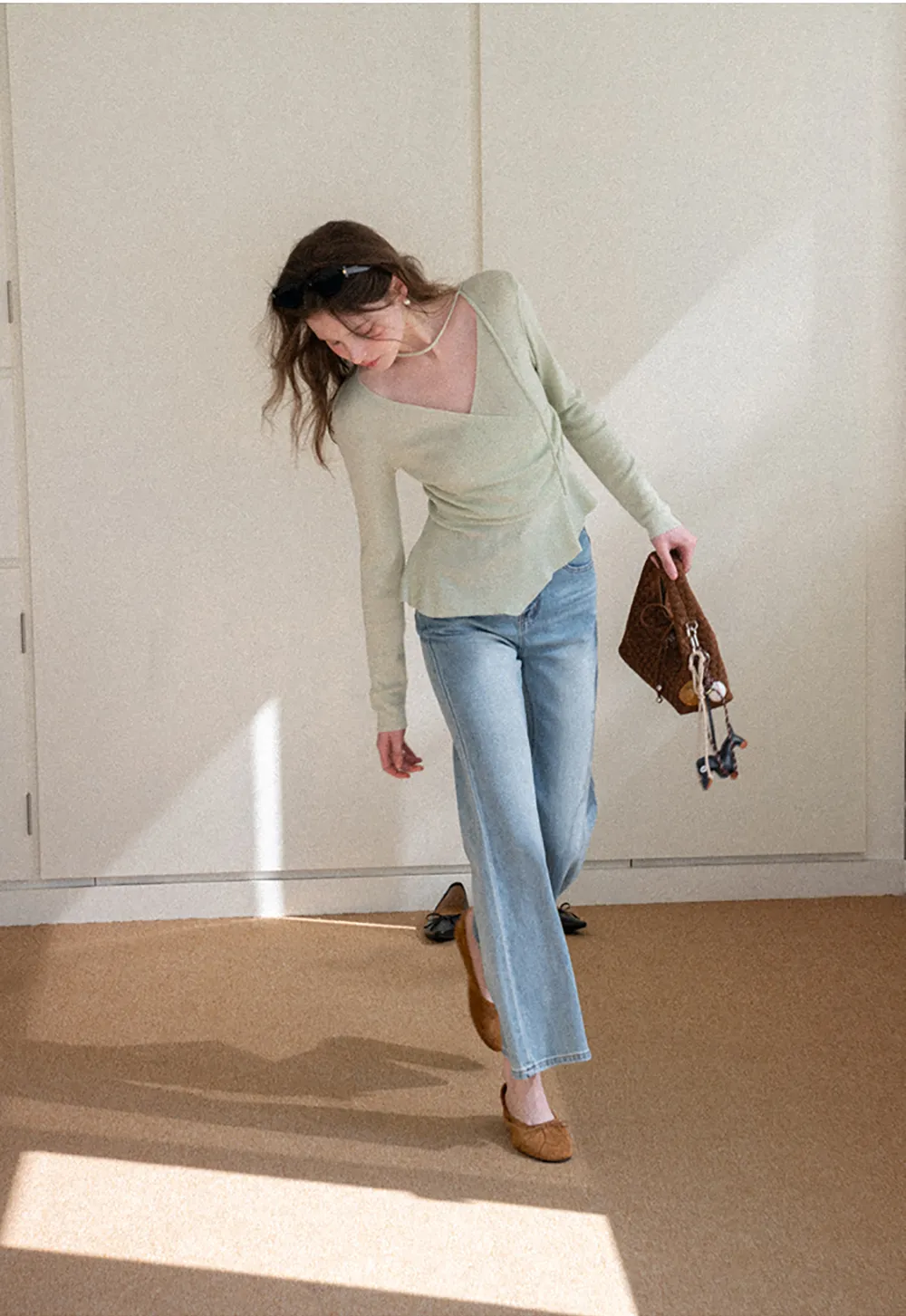 Long sleeve wrap knit sweater with ruched detail