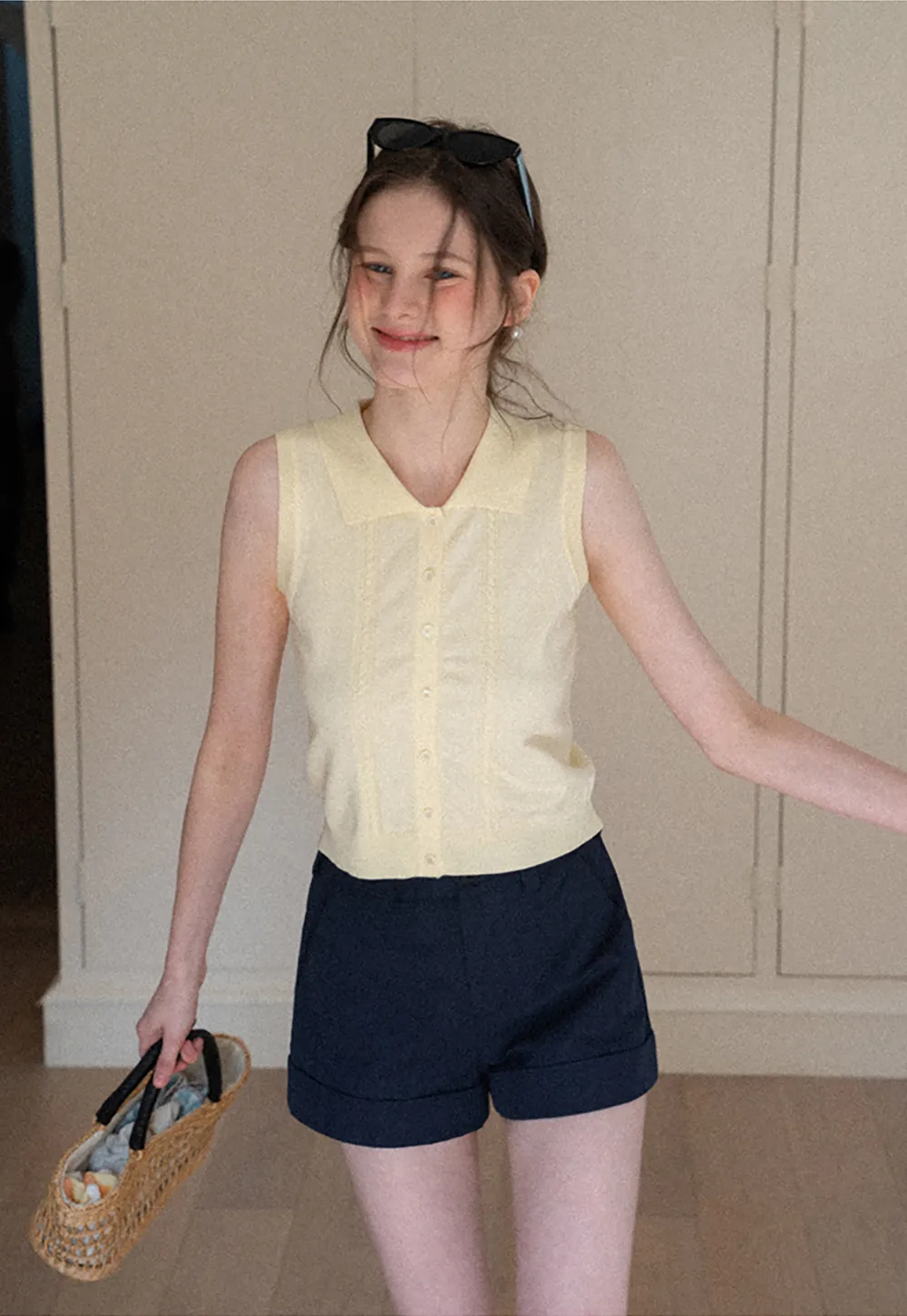 Sleeveless Knit Top with Collar and Buttons