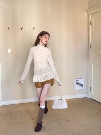 High waist pleated mini skirt with button front design